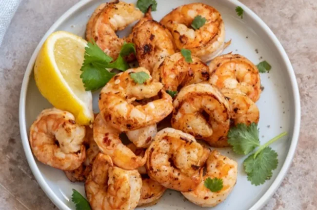 Camarones marinados con salsa de ajo, miel y soja